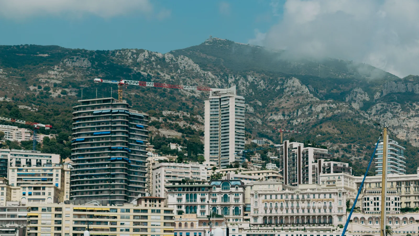 Office and apartment towers of the Monegasque business district photographed in daylight.