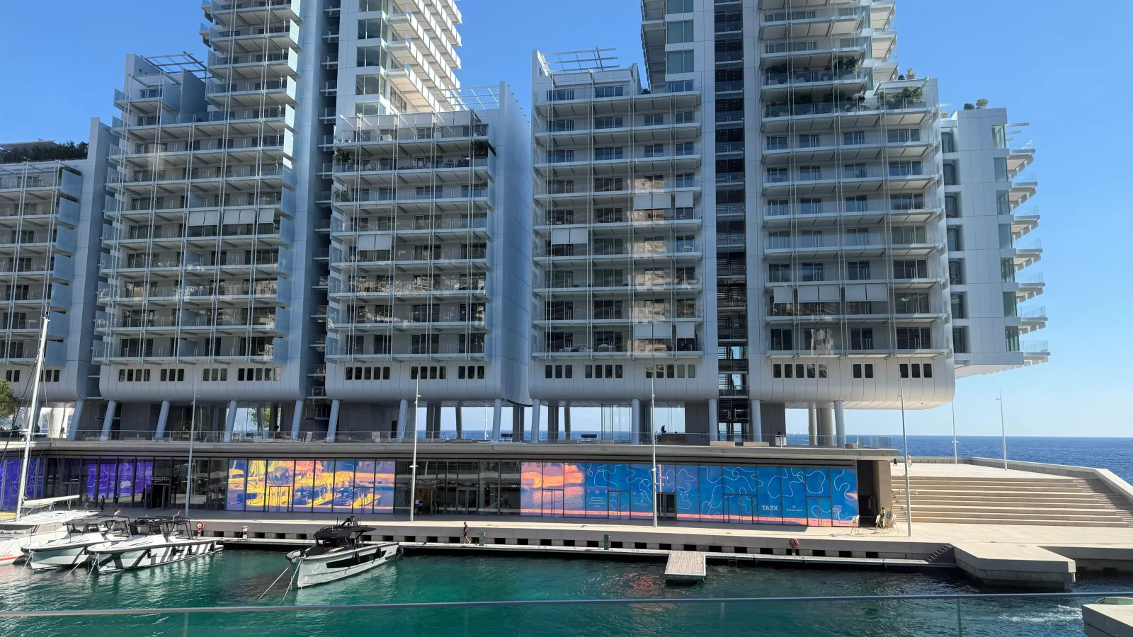 Office buildings and the working harbour on a clear day