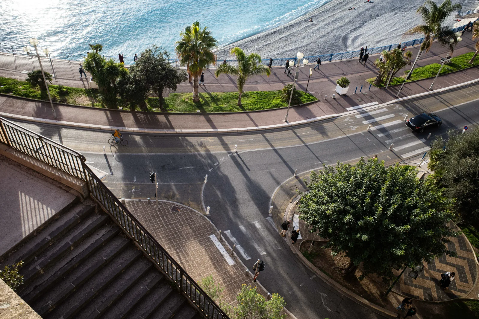 Coastal road leading into photographed from above in morning light